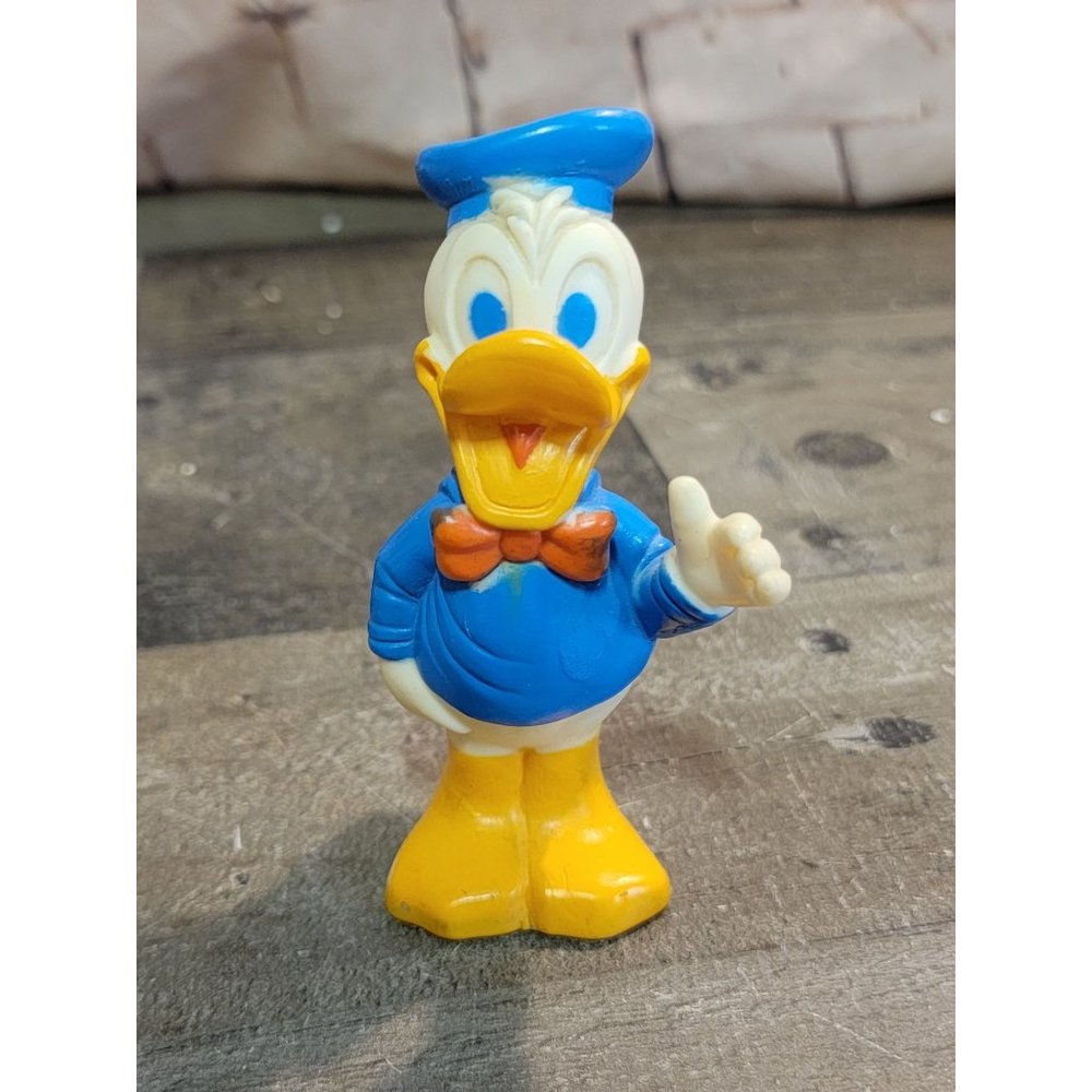 Donald Duck‎ Walt Disney production waving smiling toy figure